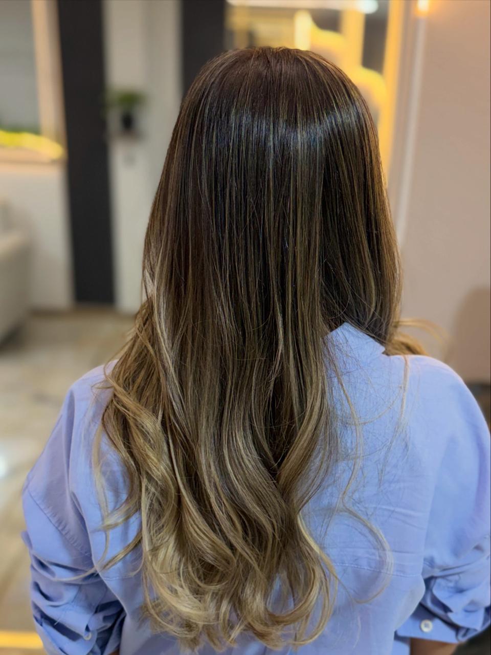Balayage visto de espalda